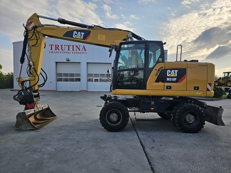 CATERPILLAR M318F - 휠 굴삭기 : 사진 1 CATERPILLAR M318F - 휠 굴삭기 : 사진 1