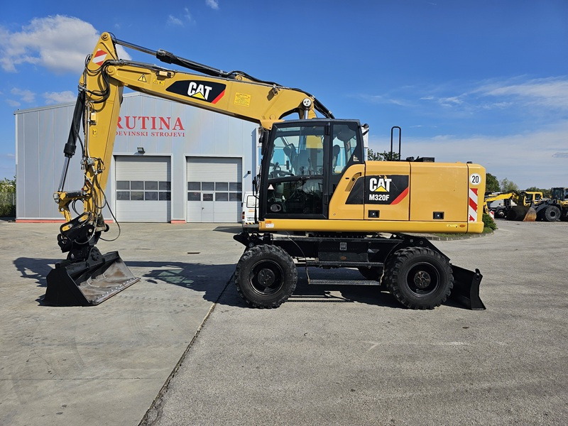 CATERPILLAR M320F - 휠 굴삭기 : 사진 1 CATERPILLAR M320F - 휠 굴삭기 : 사진 1