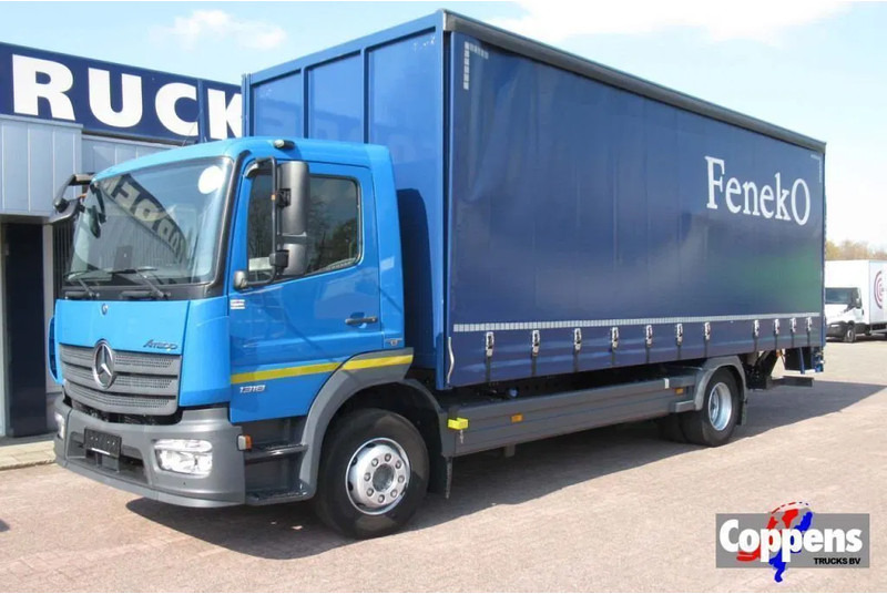 Mercedes-Benz Atego 1318L Euro 6 - 커튼사이더 트럭 : 사진 1 Mercedes-Benz Atego 1318L Euro 6 - 커튼사이더 트럭 : 사진 1