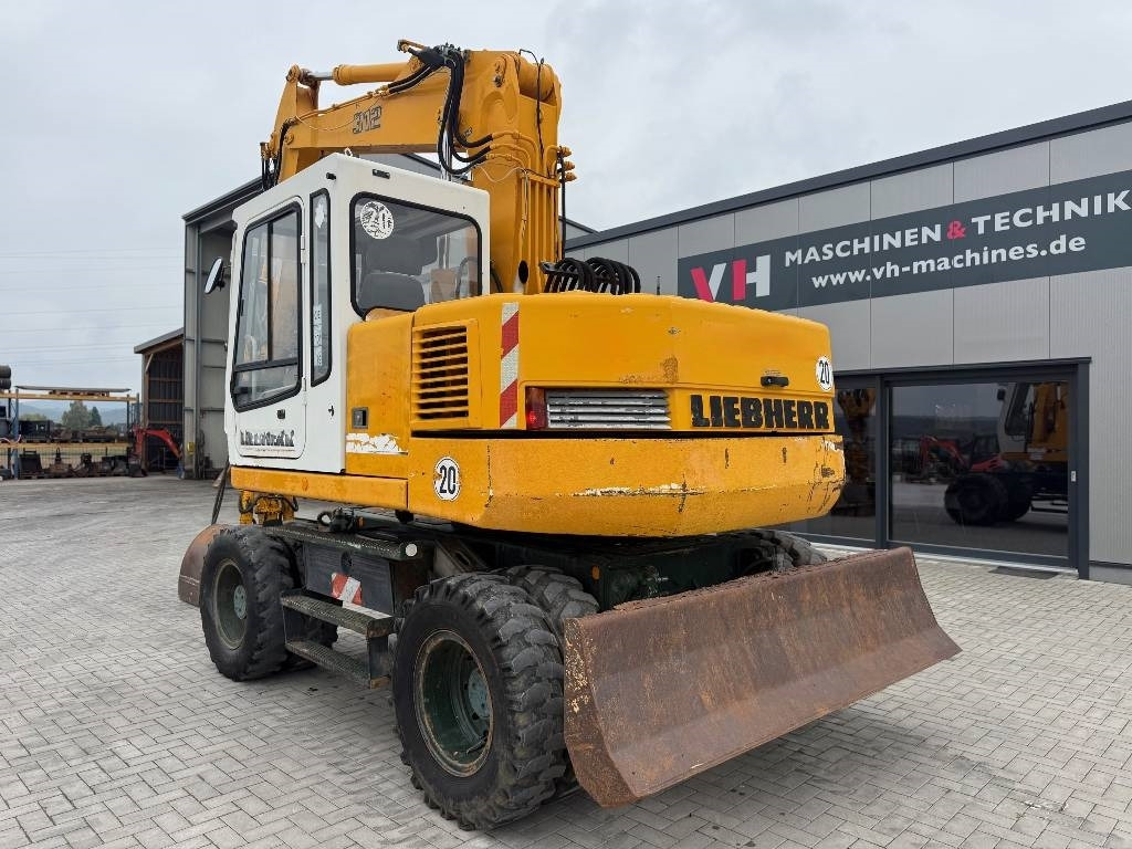 Liebherr A 312 - 휠 굴삭기 : 사진 3 Liebherr A 312 - 휠 굴삭기 : 사진 3
