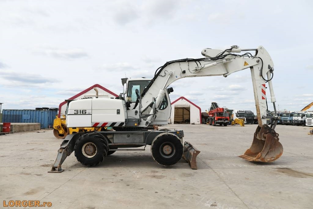 Liebherr A 316 Litronic - 휠 굴삭기 : 사진 1 Liebherr A 316 Litronic - 휠 굴삭기 : 사진 1