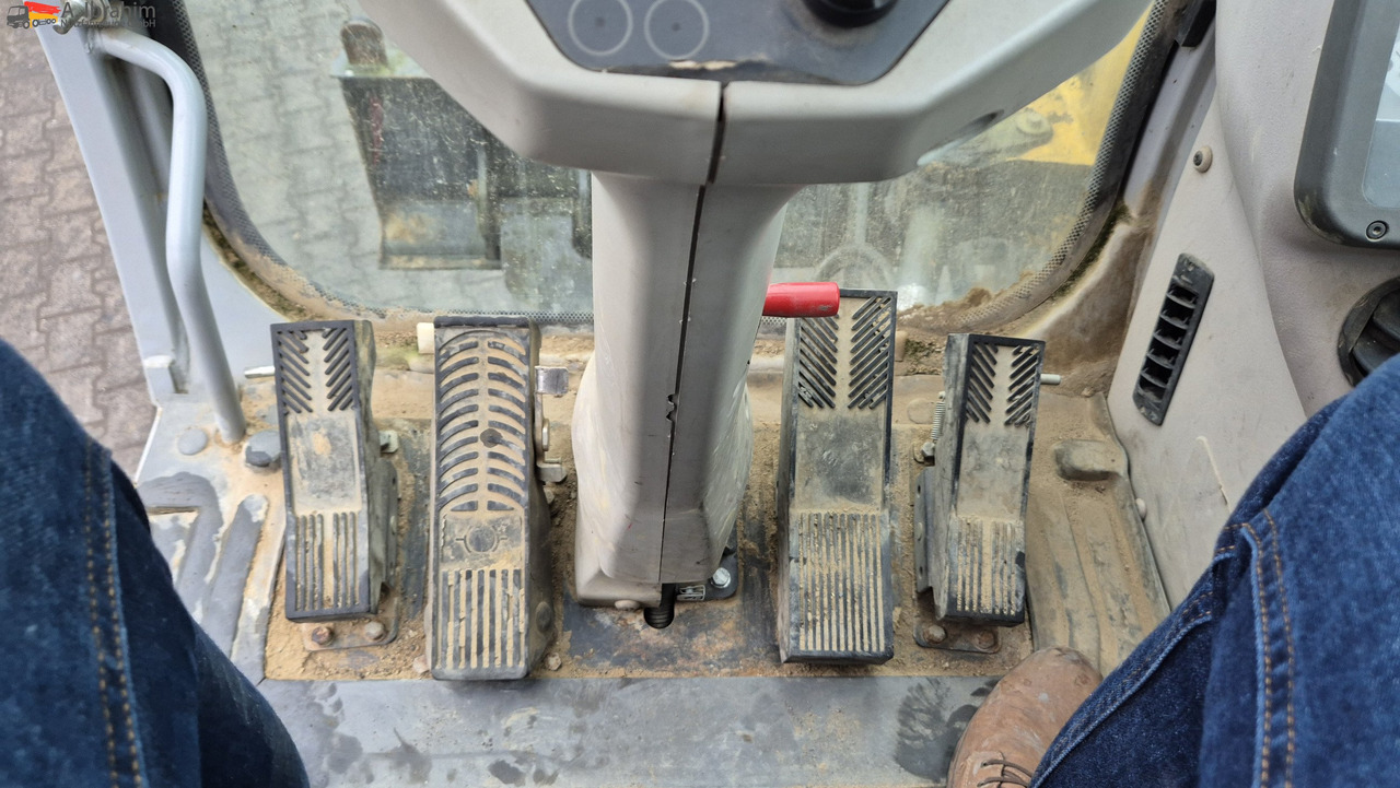 New Holland MH 2.6 Zustand gut, deutsche Maschine incl. Greifer und Dreservo - 휠 굴삭기 : 사진 5 New Holland MH 2.6 Zustand gut, deutsche Maschine incl. Greifer und Dreservo - 휠 굴삭기 : 사진 5