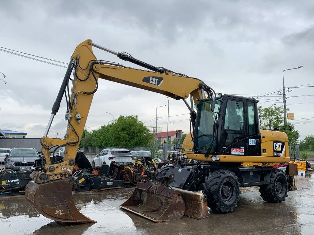 CAT M 313 D - 휠 굴삭기 : 사진 1 CAT M 313 D - 휠 굴삭기 : 사진 1