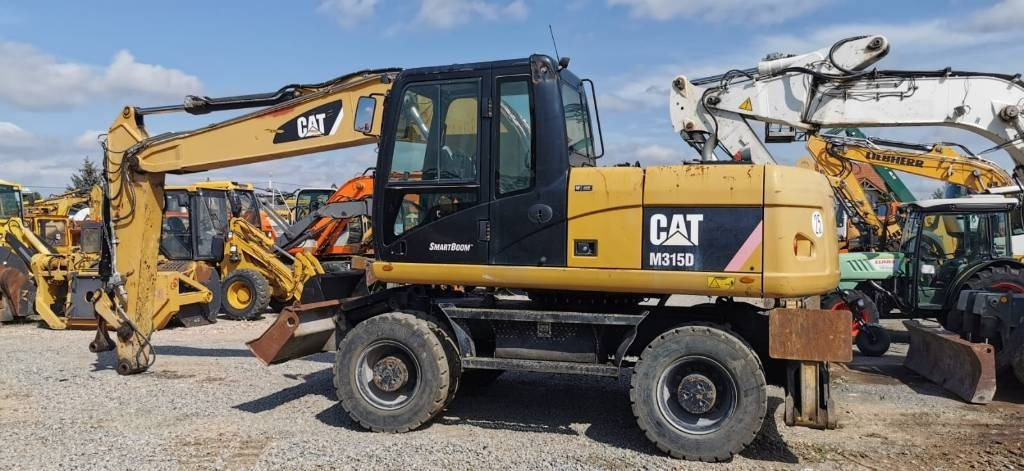 CAT M 315 D - 휠 굴삭기 : 사진 4 CAT M 315 D - 휠 굴삭기 : 사진 4