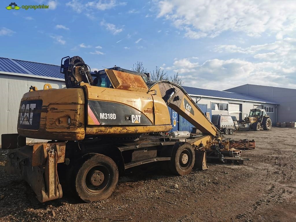 CAT M 318 D - 폐기물/ 산업 처리기 : 사진 3 CAT M 318 D - 폐기물/ 산업 처리기 : 사진 3