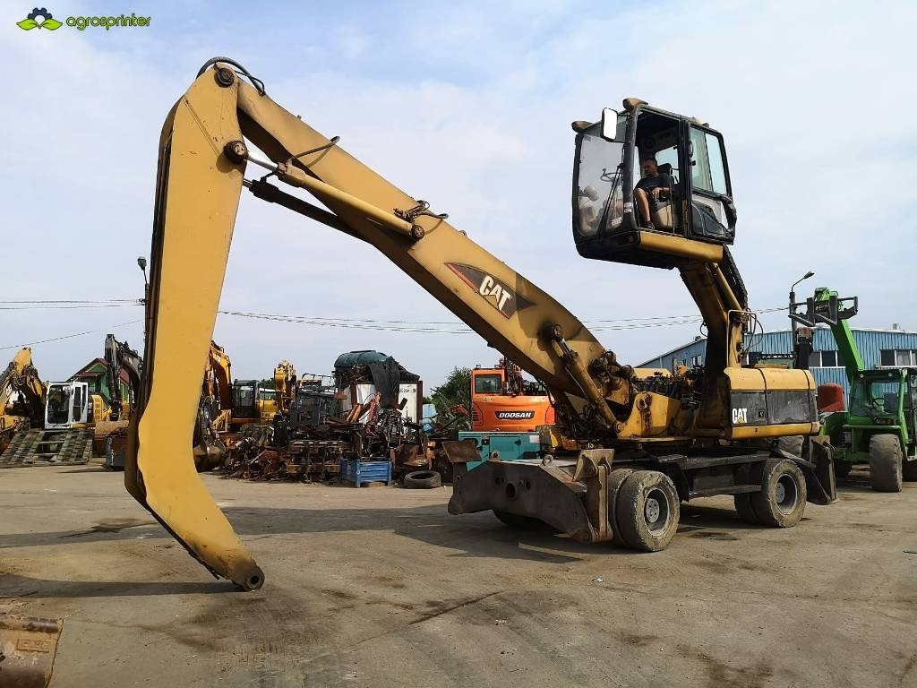 CAT M 322 C MH - 폐기물/ 산업 처리기 : 사진 1 CAT M 322 C MH - 폐기물/ 산업 처리기 : 사진 1