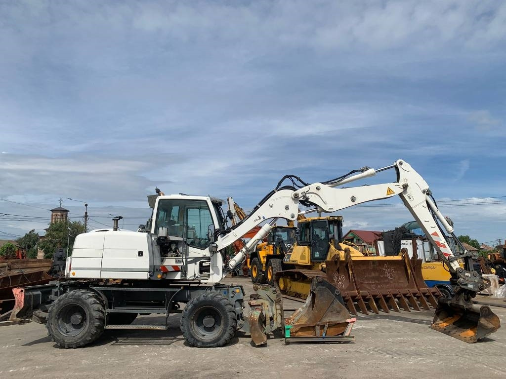 Liebherr A 311 Litronic - 휠 굴삭기 : 사진 3 Liebherr A 311 Litronic - 휠 굴삭기 : 사진 3