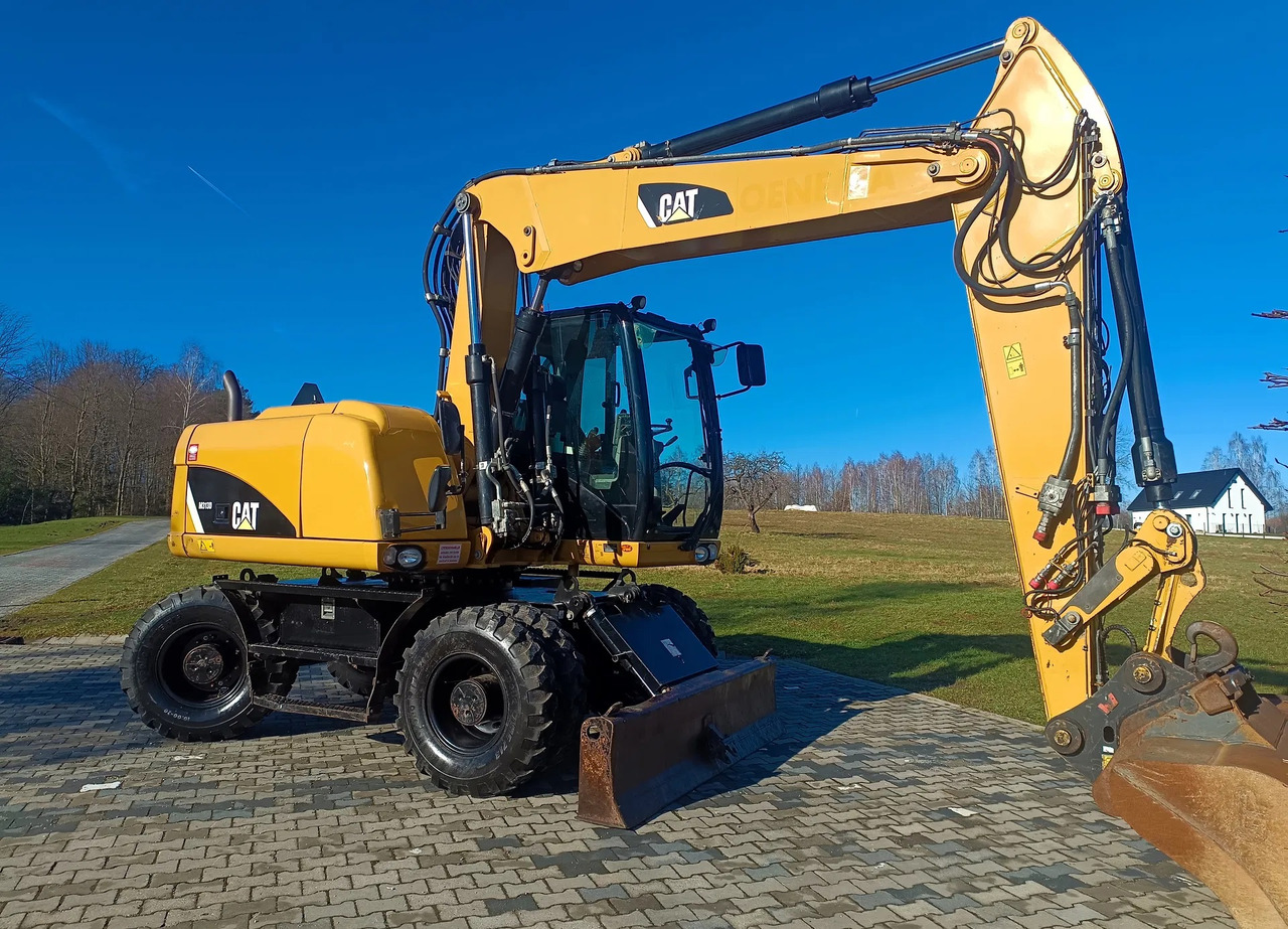 CATERPILLAR M313D - 휠 굴삭기 : 사진 2 CATERPILLAR M313D - 휠 굴삭기 : 사진 2