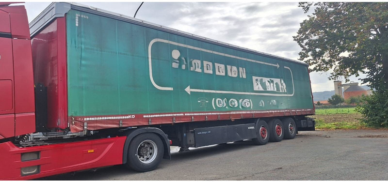 Kögel S24-1 Pritsche Plane - 커튼사이더 세미 트레일러 : 사진 1 Kögel S24-1 Pritsche Plane - 커튼사이더 세미 트레일러 : 사진 1