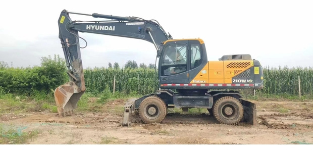 2018 Hyundai 210-9 - 휠 굴삭기 : 사진 1 2018 Hyundai 210-9 - 휠 굴삭기 : 사진 1