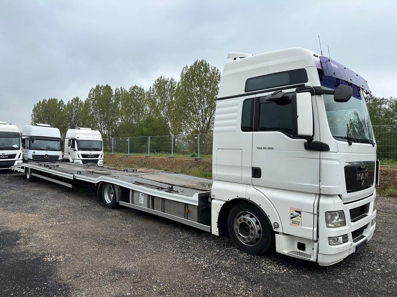 MAN TGX 18.360 Flachzug*3er*XXL*Winde*Retarder - 자동 운반 장치 트럭 : 사진 1 MAN TGX 18.360 Flachzug*3er*XXL*Winde*Retarder - 자동 운반 장치 트럭 : 사진 1