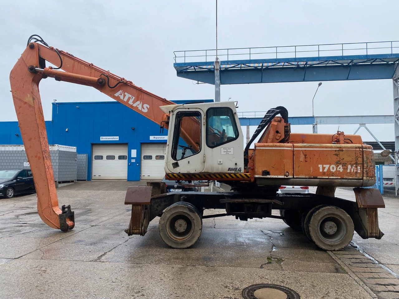 Atlas 1704 MI mit Greifer Umschlagbagger Lang - 휠 굴삭기 : 사진 1 Atlas 1704 MI mit Greifer Umschlagbagger Lang - 휠 굴삭기 : 사진 1