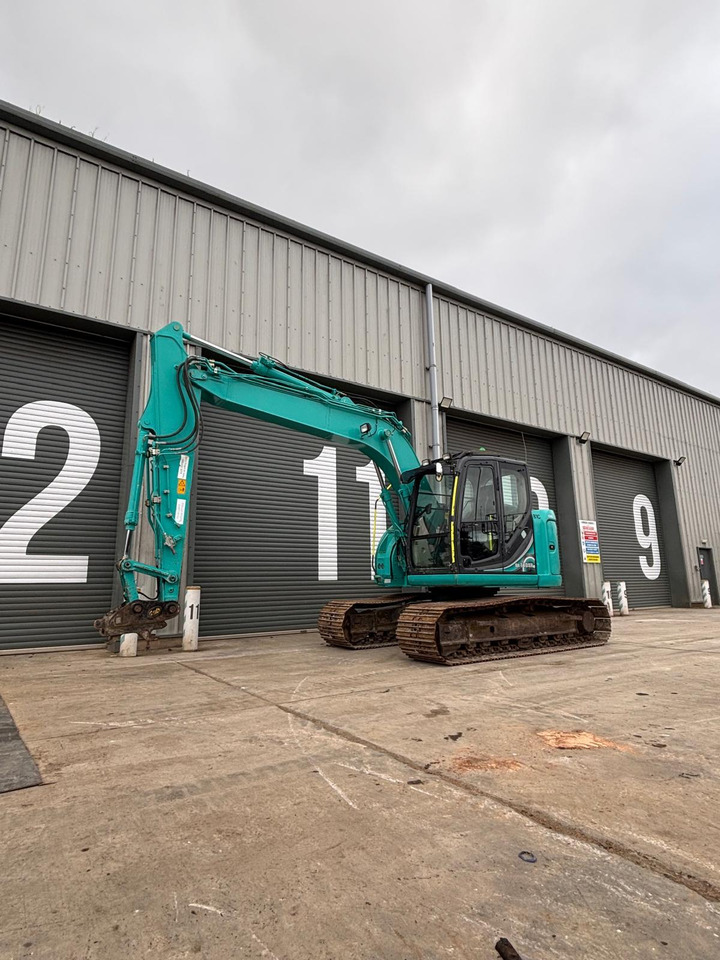 Kobelco SK140SRLC-5 - 크롤러 굴삭기 : 사진 1 Kobelco SK140SRLC-5 - 크롤러 굴삭기 : 사진 1