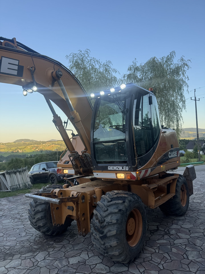 Case WX145 - 휠 굴삭기 : 사진 2 Case WX145 - 휠 굴삭기 : 사진 2