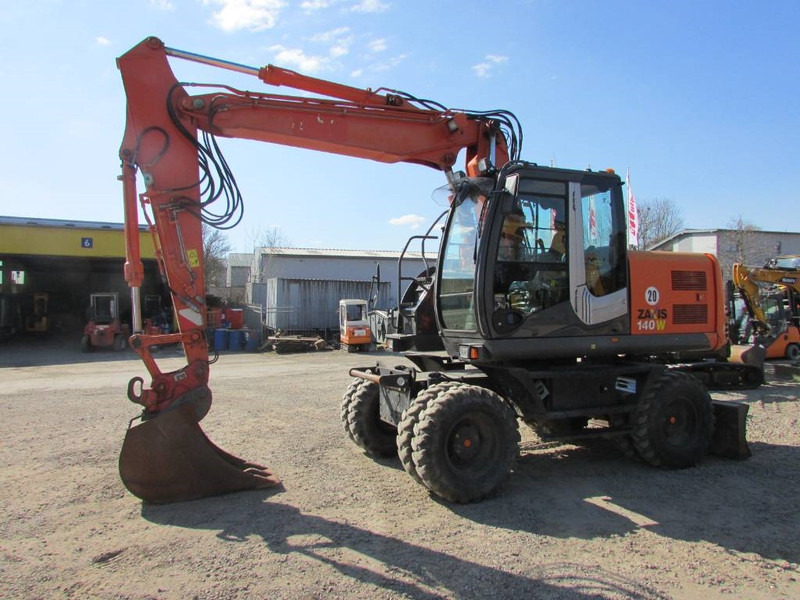 Hitachi ZX 140 W-3 Mobilbagger 43.000 EUR / Klima - 휠 굴삭기 : 사진 1 Hitachi ZX 140 W-3 Mobilbagger 43.000 EUR / Klima - 휠 굴삭기 : 사진 1
