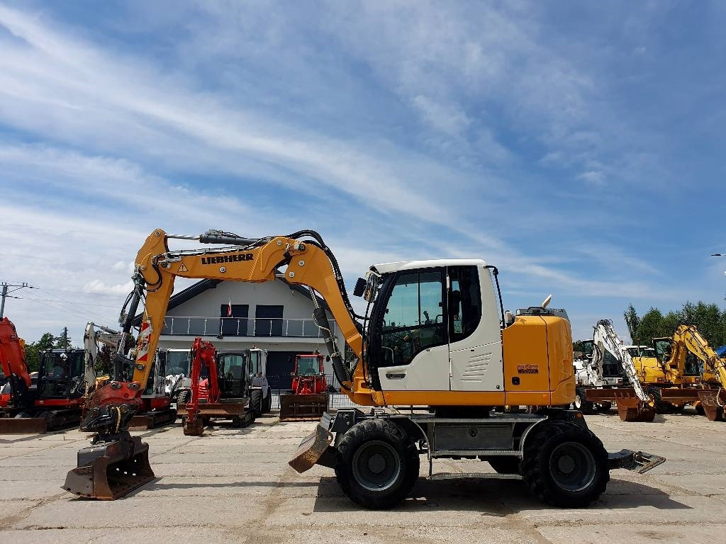 Liebherr A 910 Compact - 휠 굴삭기 : 사진 2 Liebherr A 910 Compact - 휠 굴삭기 : 사진 2