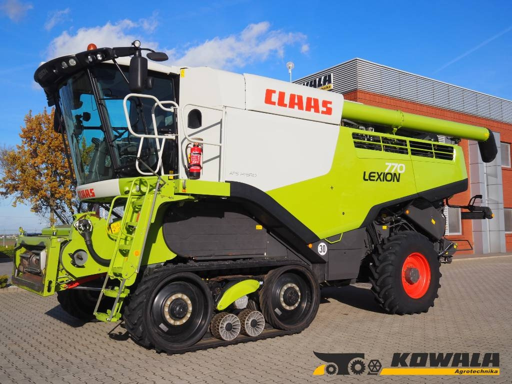 Claas Lexion 770TT 4x4 + V1200 - 목초수확기 : 사진 1 Claas Lexion 770TT 4x4 + V1200 - 목초수확기 : 사진 1