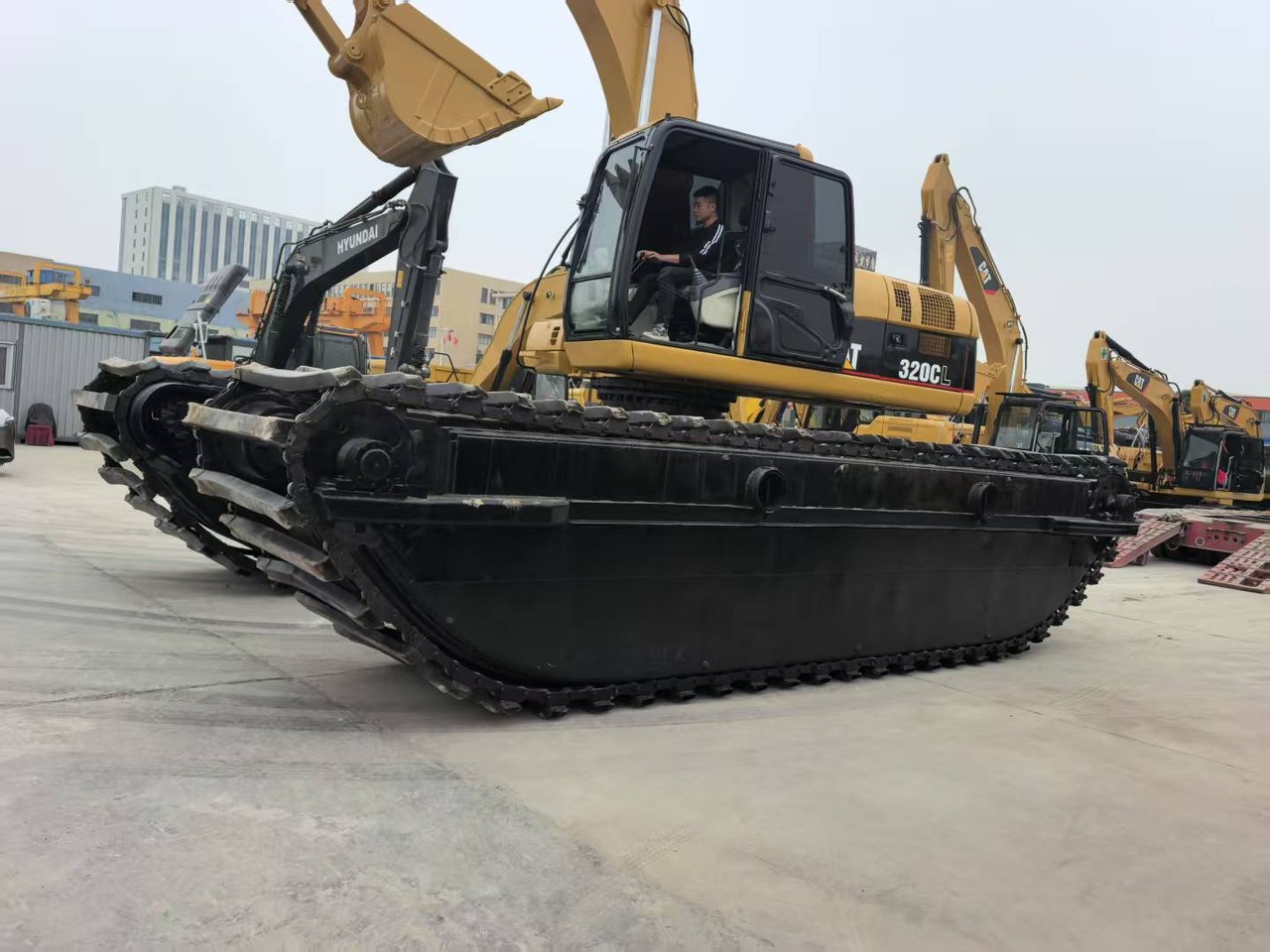 CATERPILLAR 320C boat excavator - 수륙양용 굴착기 : 사진 2 CATERPILLAR 320C boat excavator - 수륙양용 굴착기 : 사진 2