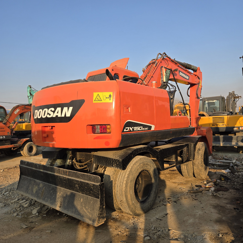 Doosan DX150W-9C - 휠 굴삭기 : 사진 5 Doosan DX150W-9C - 휠 굴삭기 : 사진 5