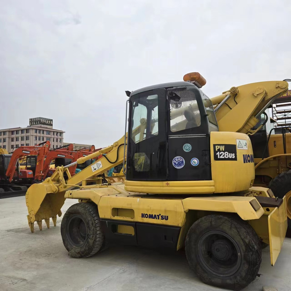 KOMATSU PC128US - 휠 굴삭기 : 사진 3 KOMATSU PC128US - 휠 굴삭기 : 사진 3