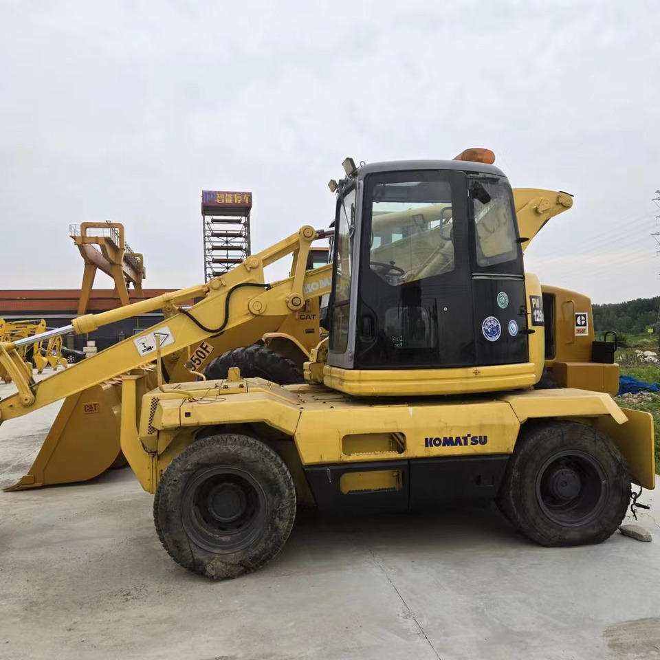 KOMATSU PC128US - 휠 굴삭기 : 사진 2 KOMATSU PC128US - 휠 굴삭기 : 사진 2