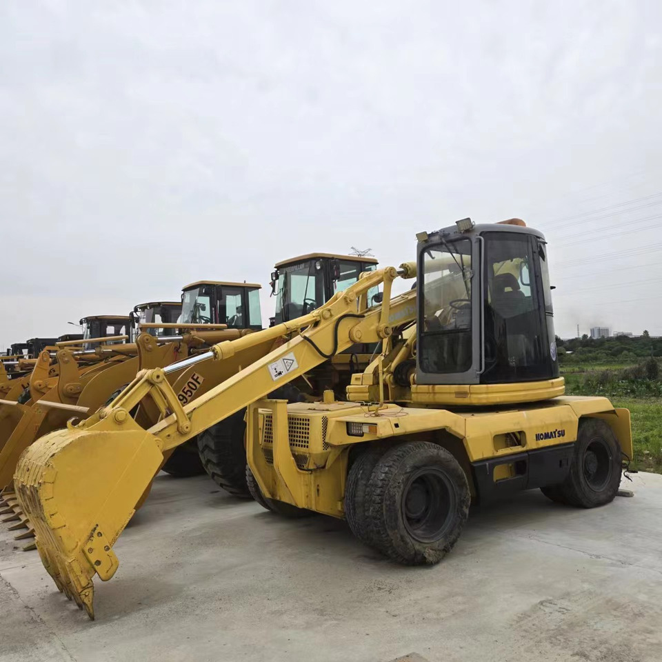 KOMATSU PC128US - 휠 굴삭기 : 사진 1 KOMATSU PC128US - 휠 굴삭기 : 사진 1