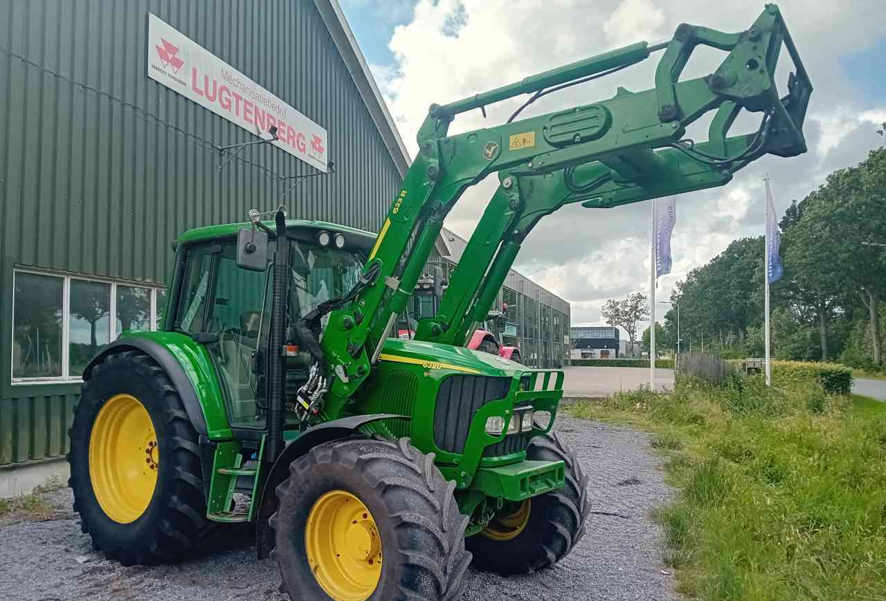 장궤형 트랙터 John Deere 6320 met 623R voorlader : 사진 1