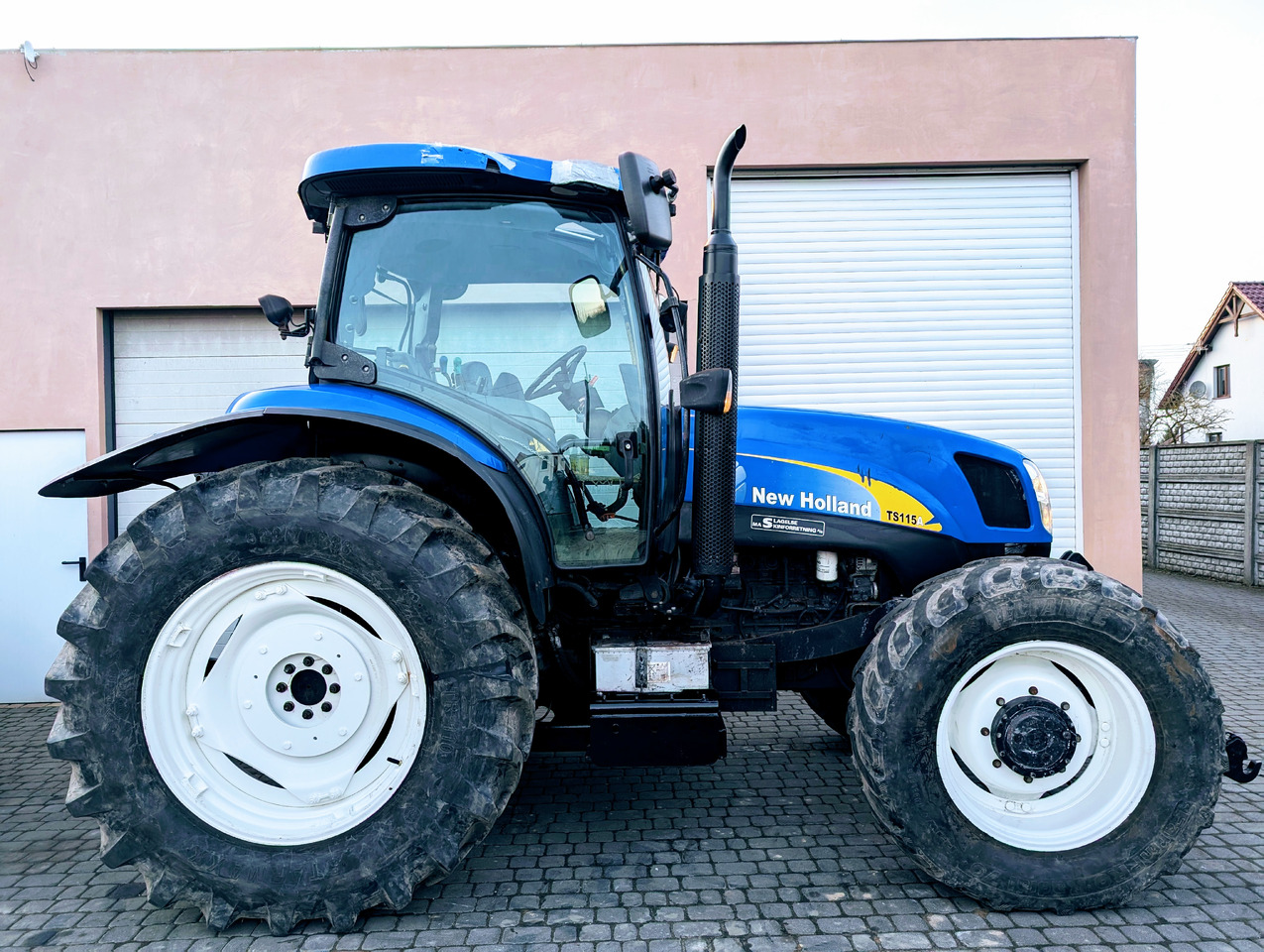 New Holland TS115A - 장궤형 트랙터 : 사진 1 New Holland TS115A - 장궤형 트랙터 : 사진 1