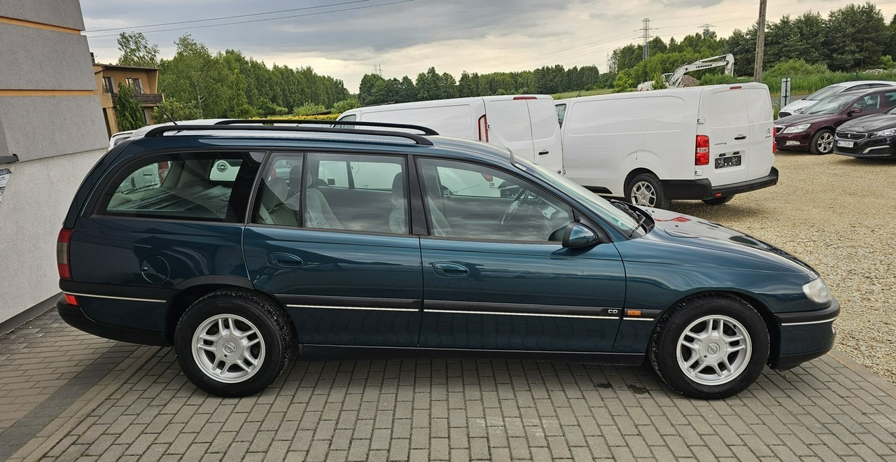 Opel Omega B 2,5 v6 *automat* napęd tył *welury* - 스테이션 왜건 : 사진 5 Opel Omega B 2,5 v6 *automat* napęd tył *welury* - 스테이션 왜건 : 사진 5
