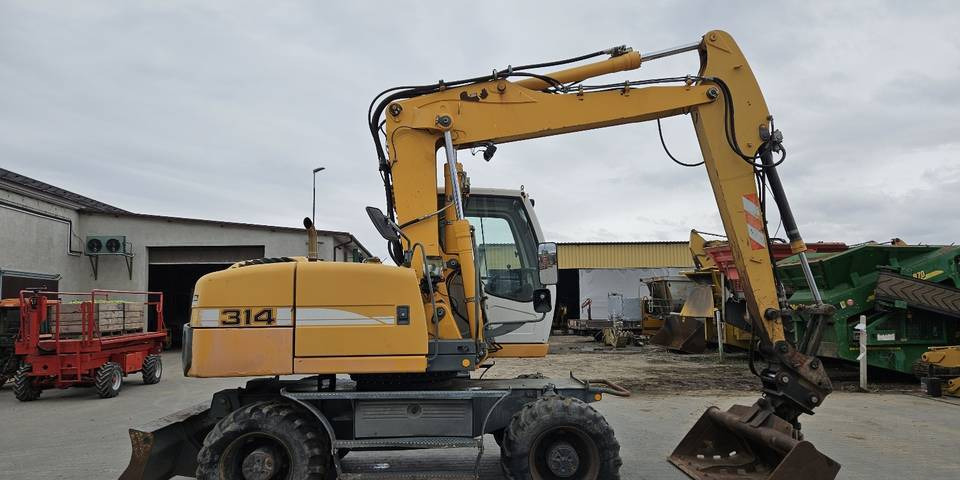 Koparka kołowa Liebherr A314 Litronic 9350 h 4 łyżki kołówka - 휠 굴삭기 : 사진 5 Koparka kołowa Liebherr A314 Litronic 9350 h 4 łyżki kołówka - 휠 굴삭기 : 사진 5