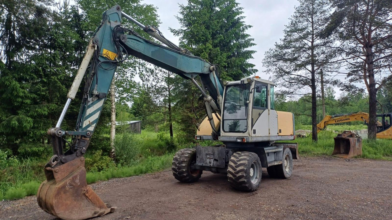 Volvo EW140 - 휠 굴삭기 : 사진 1 Volvo EW140 - 휠 굴삭기 : 사진 1