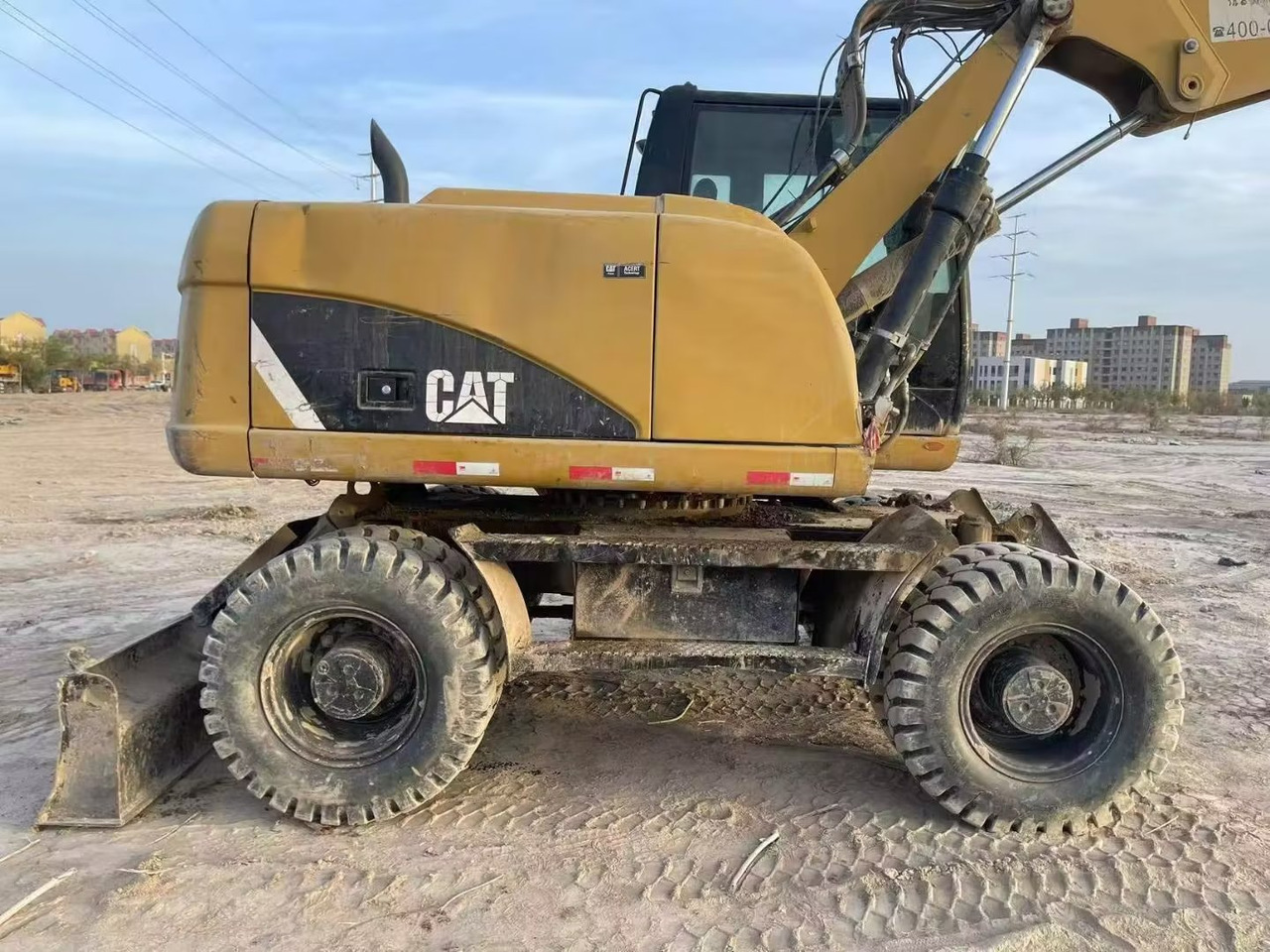 CATERPILLAR M315 - 휠 굴삭기 : 사진 1 CATERPILLAR M315 - 휠 굴삭기 : 사진 1