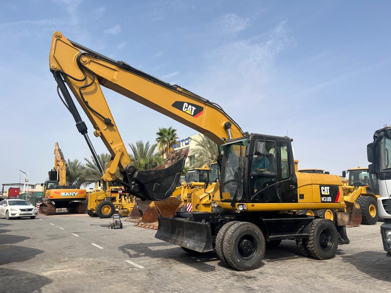 CATERPILLAR M318D - 휠 굴삭기 : 사진 1 CATERPILLAR M318D - 휠 굴삭기 : 사진 1