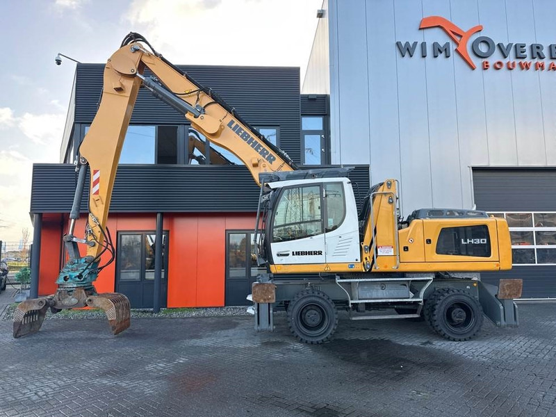 Liebherr LH 30 M - 폐기물/ 산업 처리기 : 사진 1 Liebherr LH 30 M - 폐기물/ 산업 처리기 : 사진 1