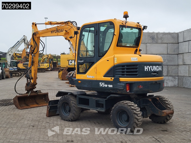 Hyundai Robex 55W-9A EPA - 휠 굴삭기 : 사진 5 Hyundai Robex 55W-9A EPA - 휠 굴삭기 : 사진 5