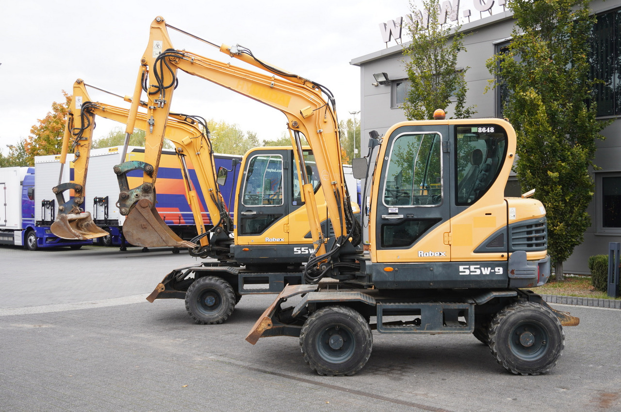 Hyundai Robex 55W-9 Wheeled Excavator 5.5t / 2pcs - 미니 굴삭기 : 사진 1 Hyundai Robex 55W-9 Wheeled Excavator 5.5t / 2pcs - 미니 굴삭기 : 사진 1