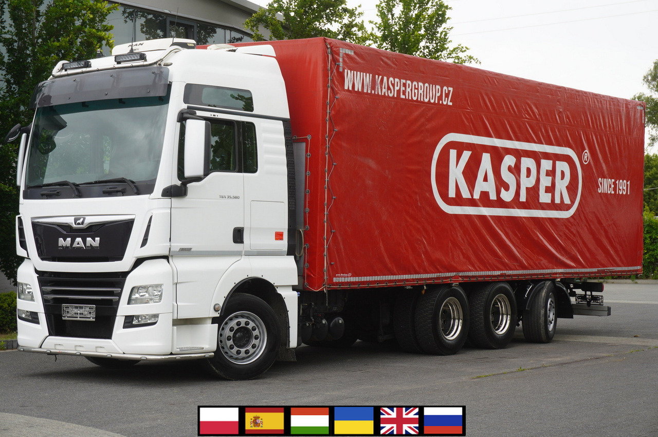 MAN MAN TGX 35.580 E6 8x4 /4 / 23 EPAL tarp superstructure / 4th axle steered - 커튼사이더 트럭 : 사진 1 MAN MAN TGX 35.580 E6 8x4 /4 / 23 EPAL tarp superstructure / 4th axle steered - 커튼사이더 트럭 : 사진 1