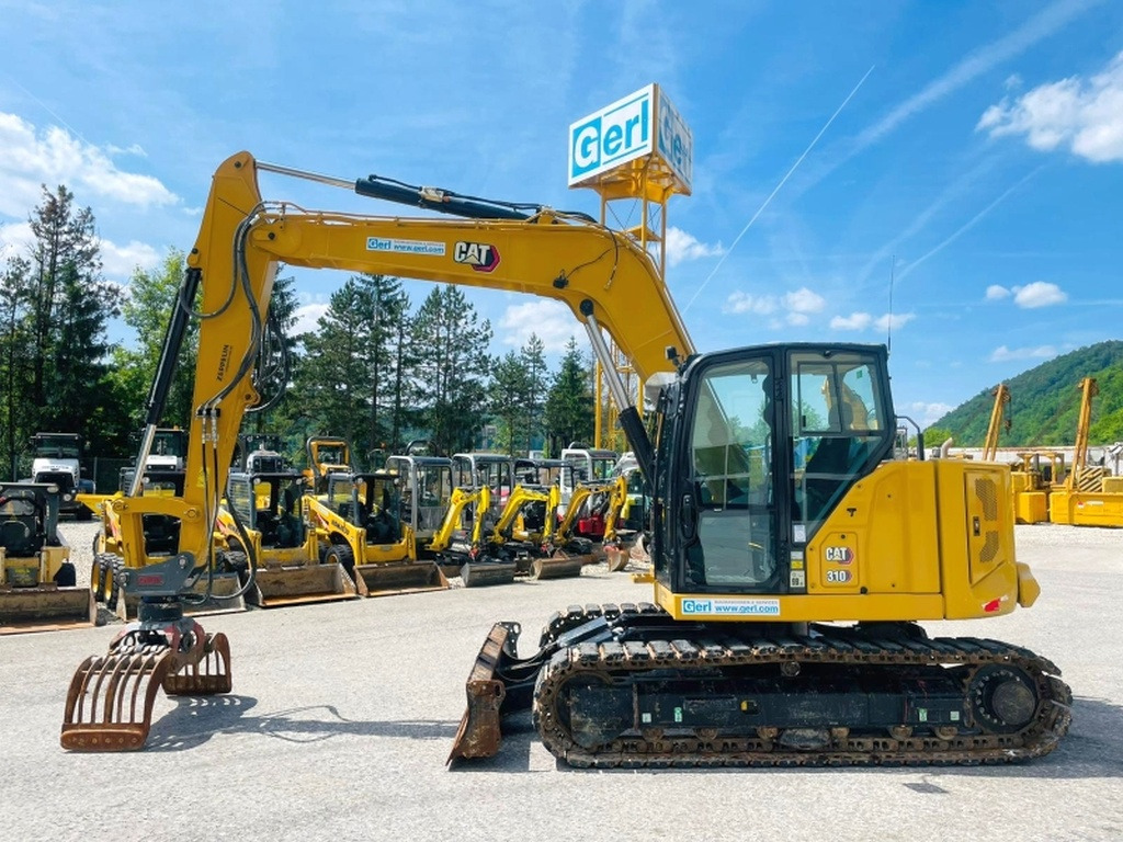 Caterpillar 310 (4011) - 미니 굴삭기 : 사진 1 Caterpillar 310 (4011) - 미니 굴삭기 : 사진 1
