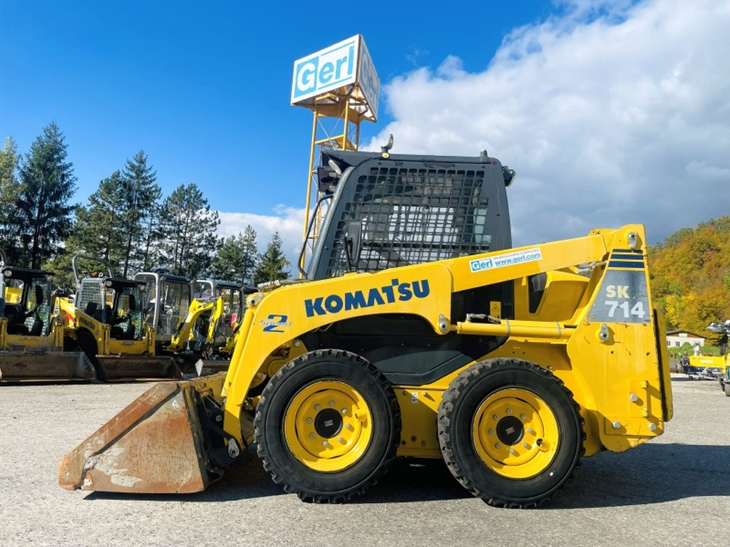 Komatsu SK714 (4077) - 스키드 스티어 로더 : 사진 1 Komatsu SK714 (4077) - 스키드 스티어 로더 : 사진 1