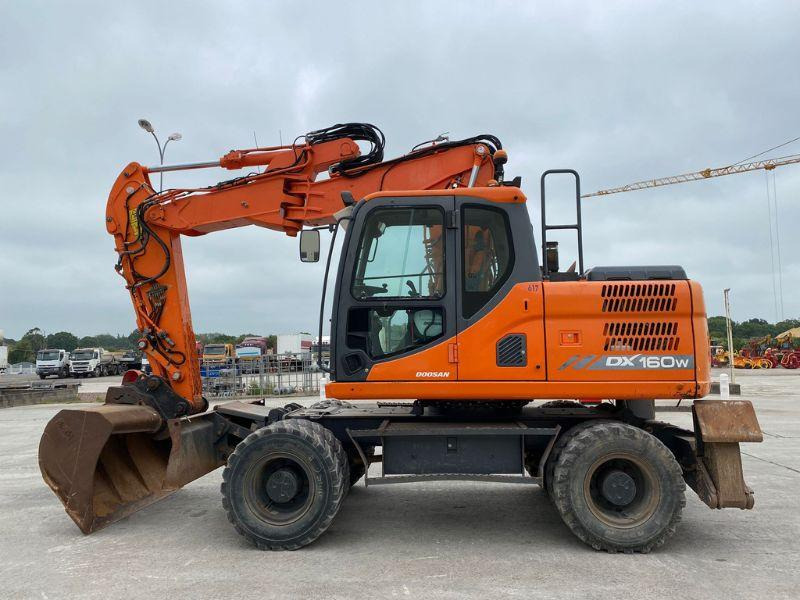 Doosan DX160 - 휠 굴삭기 : 사진 2 Doosan DX160 - 휠 굴삭기 : 사진 2