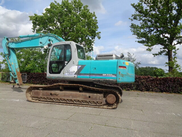 Kobelco SK250NLC - 크롤러 굴삭기 : 사진 1 Kobelco SK250NLC - 크롤러 굴삭기 : 사진 1