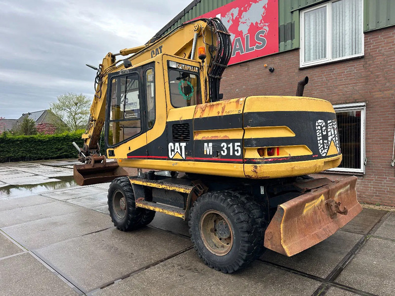 Caterpillar M315 +ROTO CE - 휠 굴삭기 : 사진 4 Caterpillar M315 +ROTO CE - 휠 굴삭기 : 사진 4