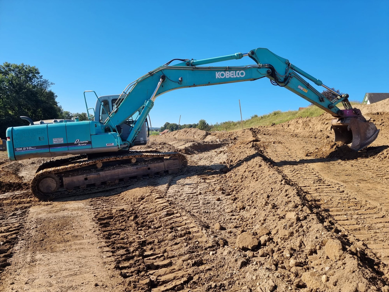 KOBELCO SK 210 NLC-6E - 크롤러 굴삭기 : 사진 2 KOBELCO SK 210 NLC-6E - 크롤러 굴삭기 : 사진 2