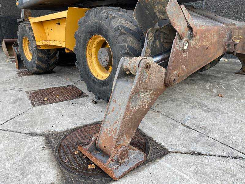 휠 굴삭기 Volvo EW 140 B : 사진 7