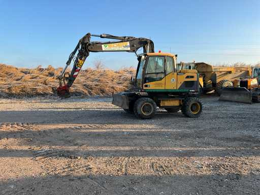 Volvo EXCAVATOR EW140D - 휠 굴삭기 : 사진 2 Volvo EXCAVATOR EW140D - 휠 굴삭기 : 사진 2