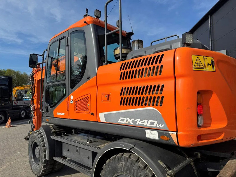 Doosan DX140-5 2018 - 휠 굴삭기 : 사진 4 Doosan DX140-5 2018 - 휠 굴삭기 : 사진 4