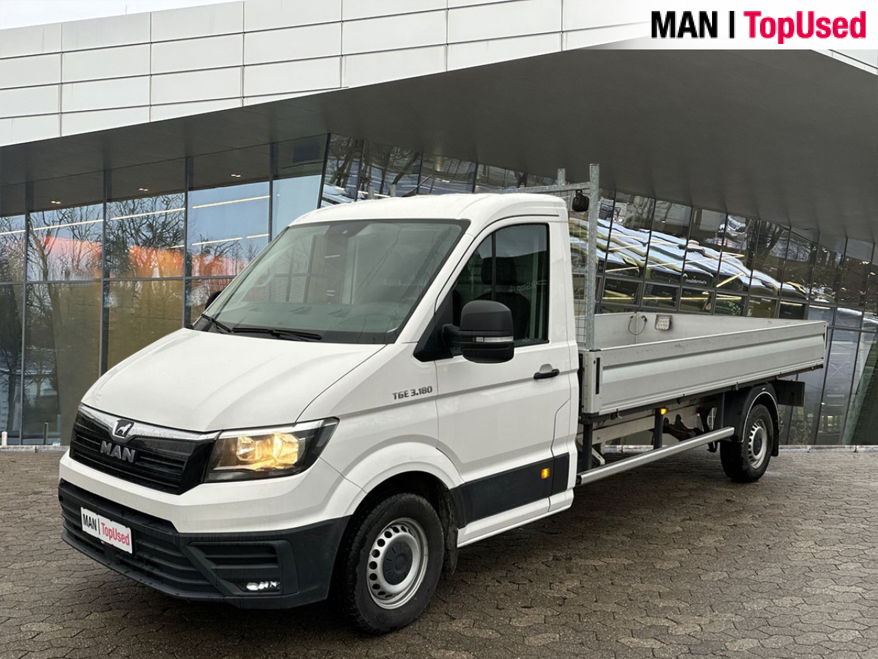 MAN TGE 3.180 4X2F SB - 플랫베드 밴 : 사진 1 MAN TGE 3.180 4X2F SB - 플랫베드 밴 : 사진 1