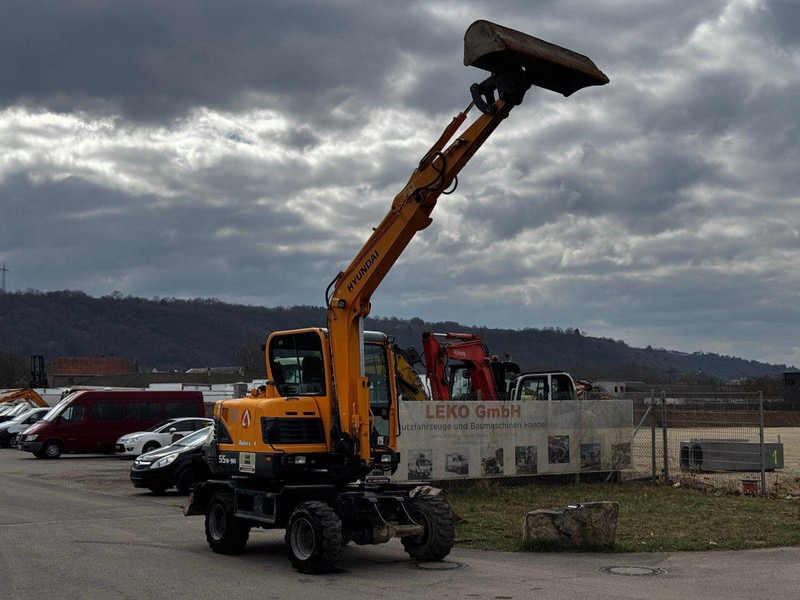 Hyundai Robex 55W-9A - 휠 굴삭기 : 사진 2 Hyundai Robex 55W-9A - 휠 굴삭기 : 사진 2