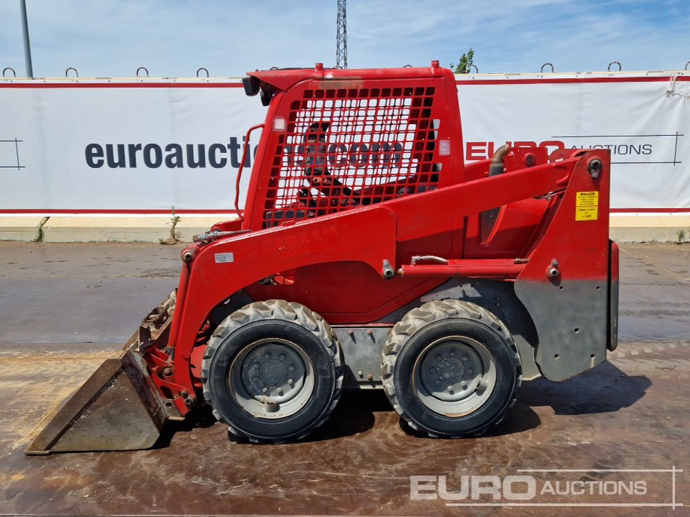 Komatsu SK-714 - 스키드 스티어 로더 : 사진 2 Komatsu SK-714 - 스키드 스티어 로더 : 사진 2