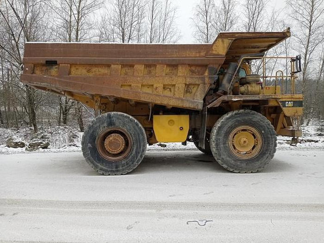덤프 Caterpillar 769D - : 사진 6